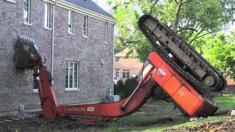 flipped over mini excavator|tipped over excavator repair.